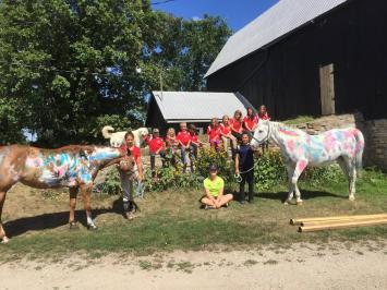 kids with painted horses during summer camp at Preston Rosedale Farm